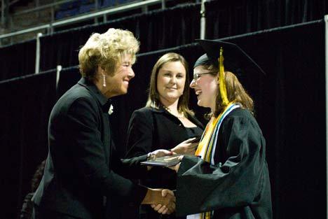 Hannah Russell receives her diploma from Principal Vicki Sherwood