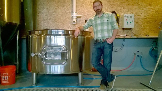 Ethan Savaglio is the co-owner of Nine Yards Brewing in Kenmore. The business is one of three breweries that have or will set up shop just off the Burke-Gilman Trail as part of an initiative set up by the city a few years ago.