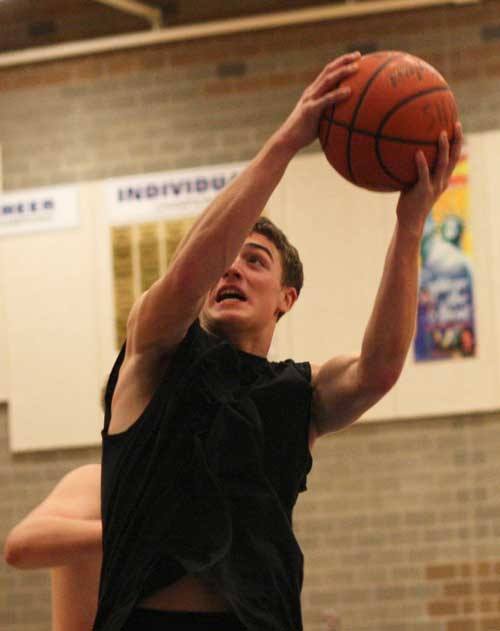 Bothell High's Braden Foley snares a rebound during Monday's practice.