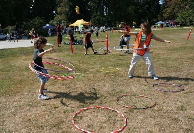 Local kids and grownups enjoyed hula hooping during Kenmore's Day of Play in August at Rhododendron Park.