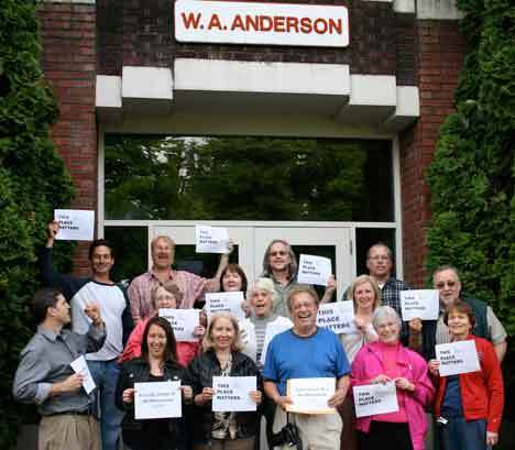 Local residents supporting the preservation of the W.A. Anderson building on Bothell Way Northeast gathered outside the school June 23. The group included the chair of Bothell's Landmark Preservation Board