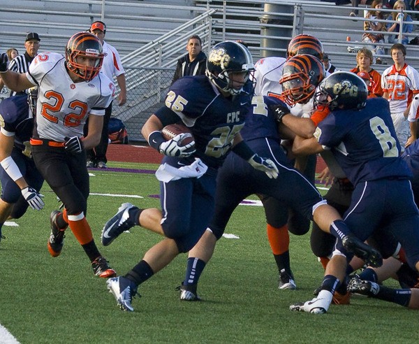 Cedar Park running back Daniel Watts goes for one of his 22 carries during the Eagles' 29-0 shutout over the Granite Falls Tigers last Friday night.