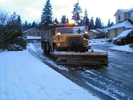A city of Bothell truck complete with a snow plow does its job during the 2008 storm.
