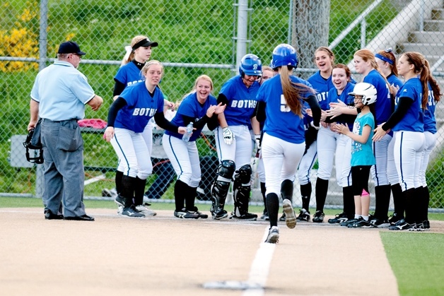 Bothell High School softball player Julia Warner heads to home plate after blasting a home run against Woodinville.