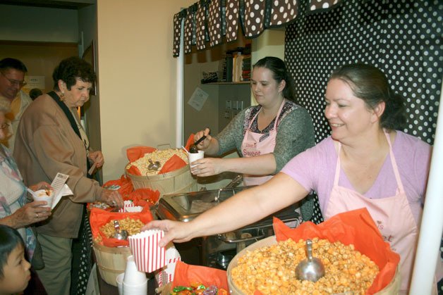 Eighth annual Bothell Chilifest  raised money and food donations for Hopelink. Sweet Lady Buffet participants Wendy Amundsen