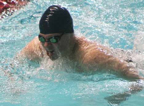 Inglemoor High sophomore Casey Colella swims the breaststroke portion of the Vikings' 200-yard medley relay in the consolation final at Saturday's 4A state swimming and diving championships at the King County Aquatic Center in Federal Way.