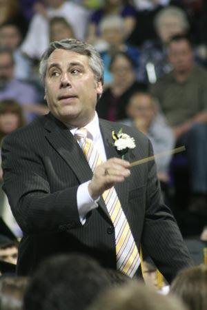 Ted Christensen directs the symphonic band at Inglemoor High's recent graduation ceremony.