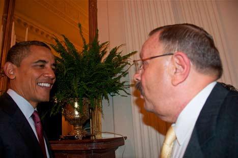 President Barack Obama visits with Kenmore Mayor David Baker at the White House.