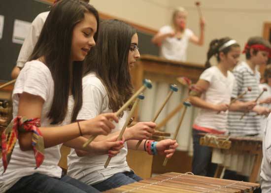 Canyon Creek Elementary's marimba band kick off yesterday's 'Light a Fire for Learning' Northshore School Foundation luncheon at the Lynnwood Convention Center.