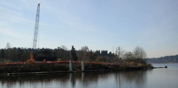 Contractor Kiewit/General/Manson (KGM) workers prepare the Kenmore site for the construction of State Route 520 bridge components.