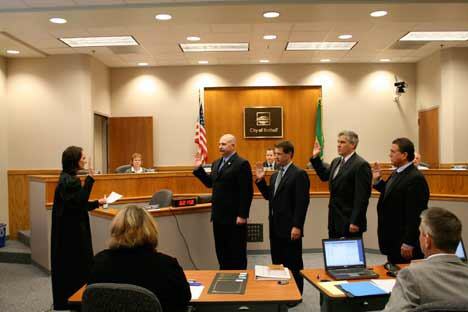 Bothell Municipal Judge Michelle Gehlsen swears in returning Bothell City Council members