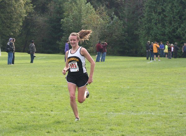 Inglemoor High senior Tansey Lystad cruises to fourth place at Thursday's 4A Kingco championship meet at Lincoln Park in West Seattle.