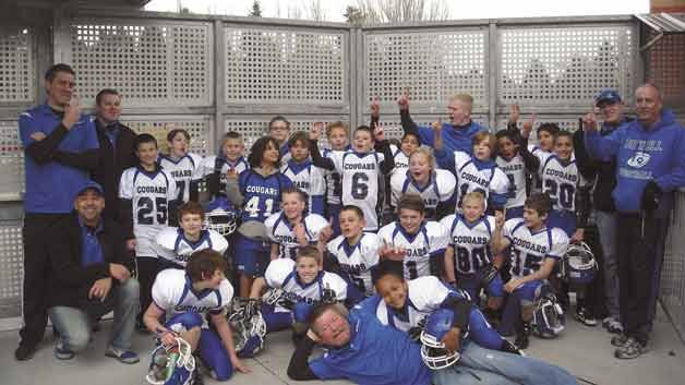 Bothell Cougars Junior Football Association Cubs Blue team captured the Greater Eastside Junior Football Association's title at Pop Keeney Stadium last Saturday.