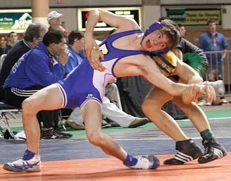 Bothell High's Chris Ungerecht faces Evergreen High's Payton Zeller at 103 pounds in the second round of the Mat Classic at the Tacoma Dome last Friday.