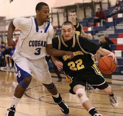 Bothell High's Dominic Ballard guards Inglemoor High's Jerry Molina in last Friday's 4A Kingco tournament matchup. Bothell won