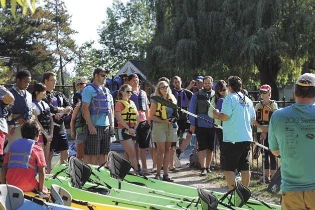 UW Bothell students received a real world lesson through a clean up of the Sammamish River Slough in Bothell.