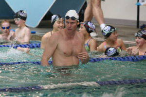 Olympic gold medalist Josh Davis keeps a close eye on swimmers during the recent WAVE Aquatics Breakout! clinic at Juanita High.