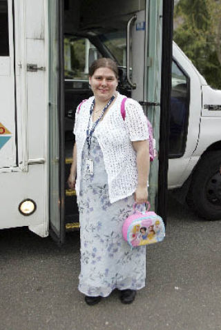 Kori Rothweiler exits a King County Metro Access bus after a day of work at Children’s Hospital May 1.