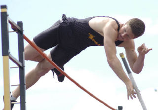 Top: Inglemoor High’s Ian Quinn pole vaults to first place at the 4A State Track Meet last weekend in Pasco. Bottom left: Inglemoor’s Lindsay Finch tears through the 400-meter run. Bottom right: Bothell’s Tim Clendaniel competes in the triple jump.