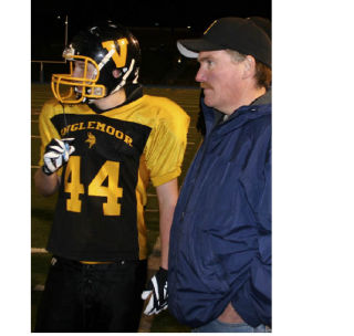 Duane Ranstrom with his son