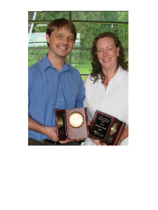 Jared Leising and Melissa Estelle sport their Excellence in Teaching