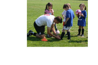 Around 80 young athletes invaded the Pop Keeney Field grass pitch last Wednesday to partake in coach Alex Zahajko’s Cougar Soccer Camp. Left