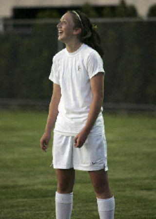 Inglemoor High senior Meghan Peterson has a laugh during practice last week.