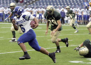 Bothell High’s Patrick Ottorbech  carries the ball downfield during a Best of the West game against Redmond High Sept. 20 at Qwest Field. Bothell won