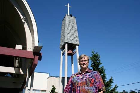 New First Lutheran Church pastor Tor Berg stands in front of the Bothell location