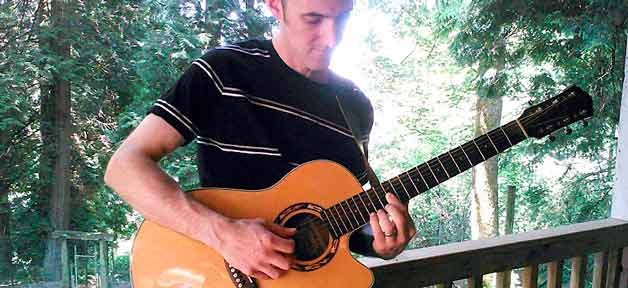 Christian Fingerstyle guitarist Josh Snodgrass will perform April 13th at The Den Coffee House and Café in Bothell.