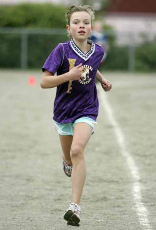 West Hill Elementary fourth-grader Sierra Myers finishes first at the Western Division Elementary Cross Country Finals Oct. 15 at Lockwood Elementary.