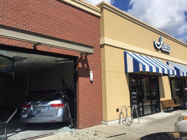 A minivan drove through a storefront before coming to a stop after crashing into an interior wall at Ivar’s in Bothell. Contributed/Bothell Police Department