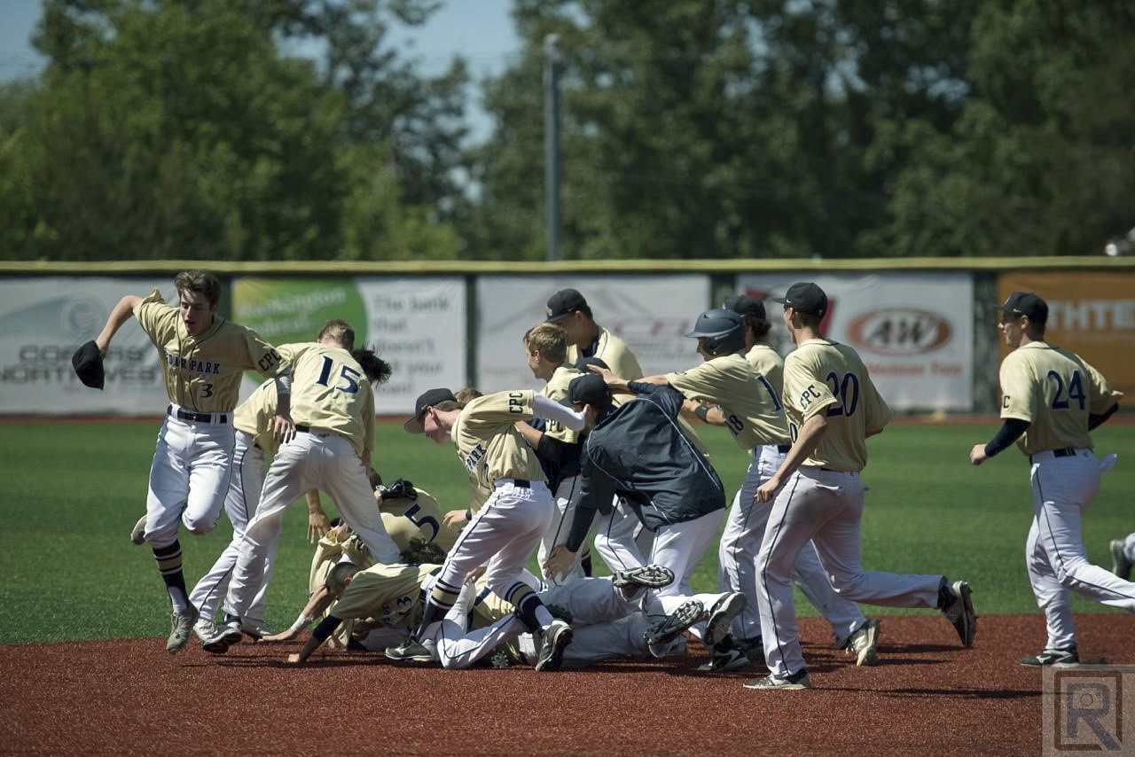 The Cedar Park Christian baseball team celebrates a 2-1 win over Lynden Christian in the district quarterfinals on Saturday