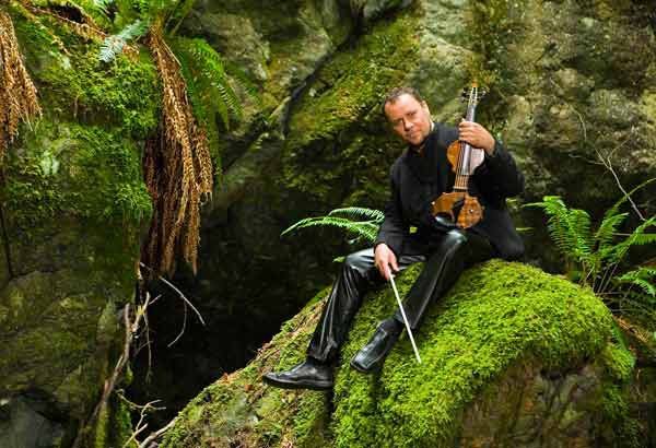 Kenmore resident Geoffrey Castle will play his six-string electric violin during the 8th Annual St. Patrick’s Eve Concert at the Kirkland Performance Center on March 16.