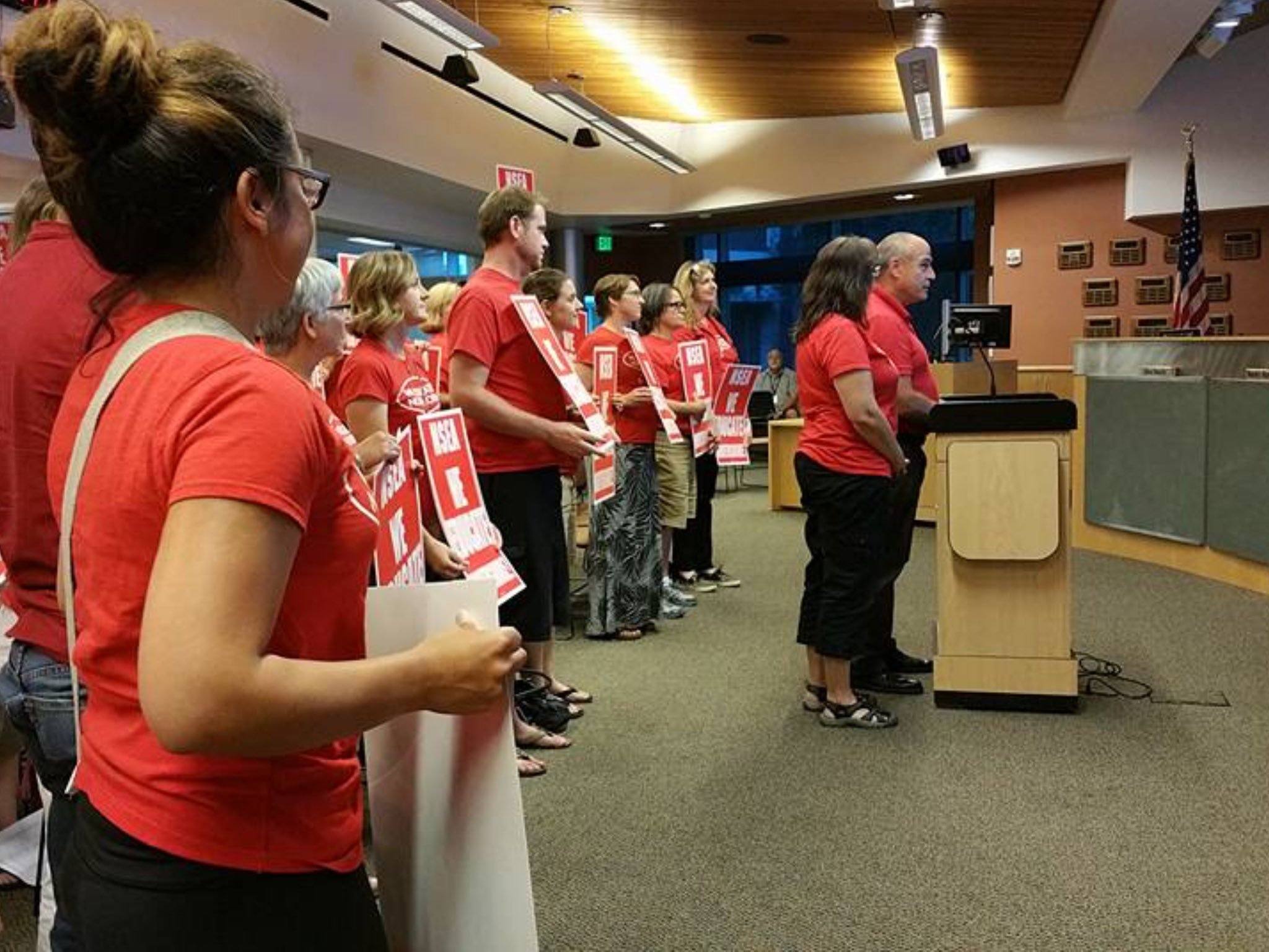 Union members pack a board meeting on Tuesday