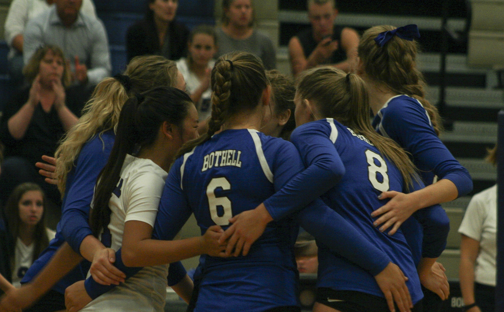 The Bothell High volleyball team pauses during a break in the action on Thursday