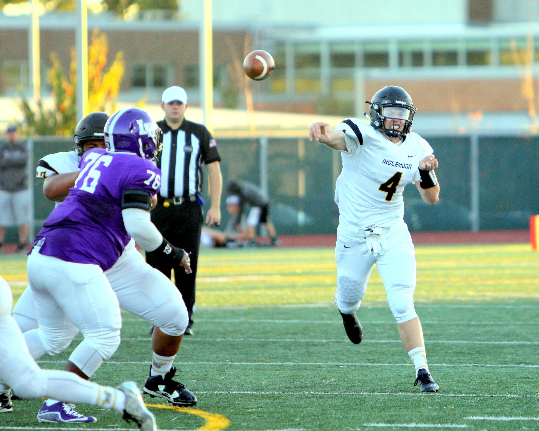 Inglemoor quarterback Brayden Mills (4) throws a pass during the Vikings’ loss to Lake Washington on Sept. 9. Mills broke a bone in his right leg and dislocated his right ankle