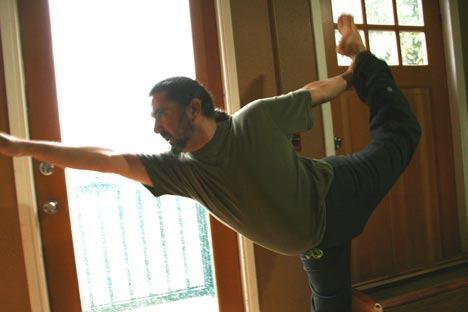 Vidal Bitton strikes a yoga pose