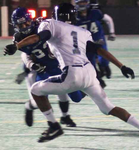 Bothell High tight end Evan Hudson charges up field last Friday night against Rogers High.