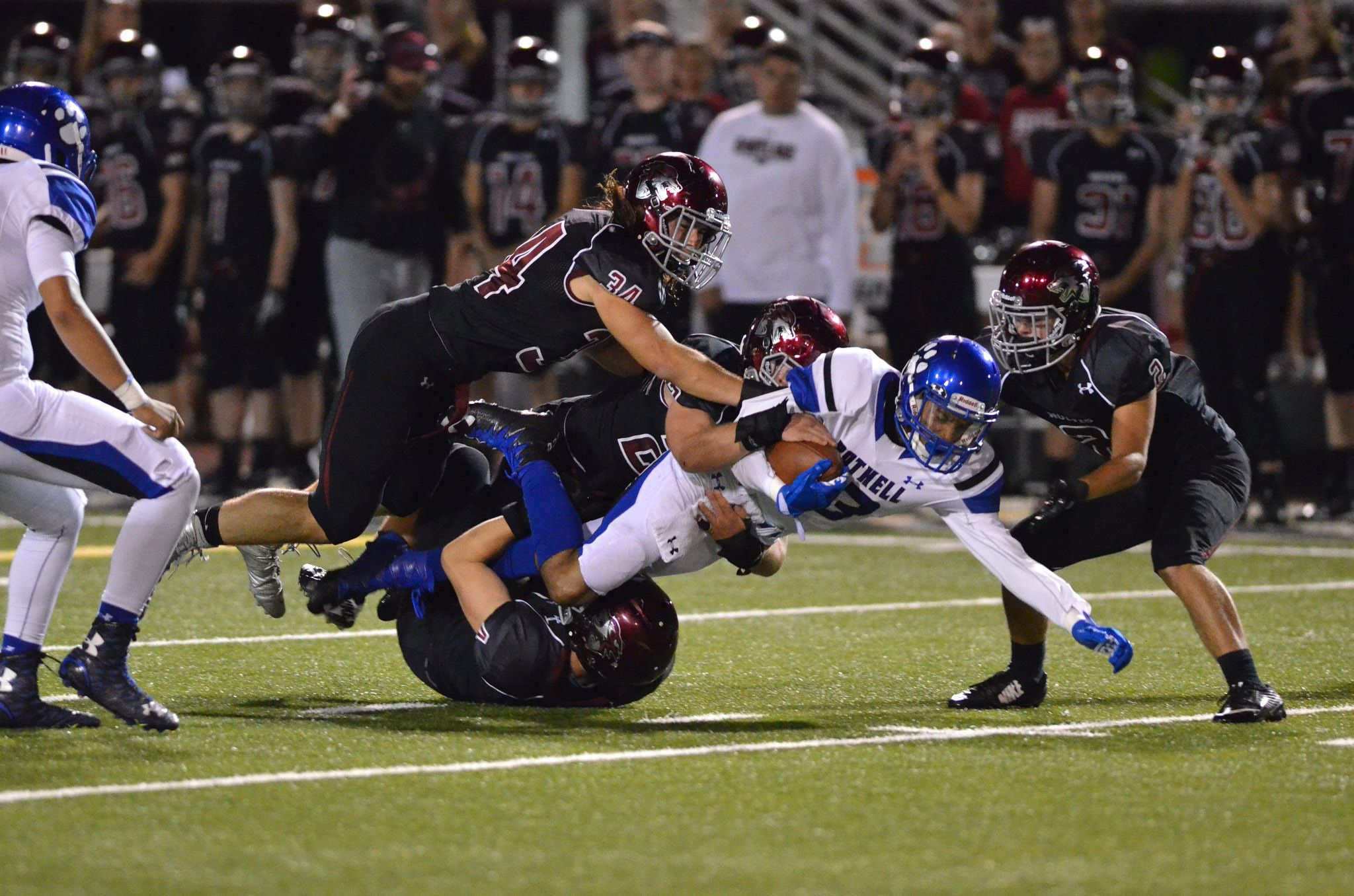 Bothell junior Da’Vicious Wilson (13) dives for extra yardage during the Cougars’ 21-19 win over Eastlake on Friday