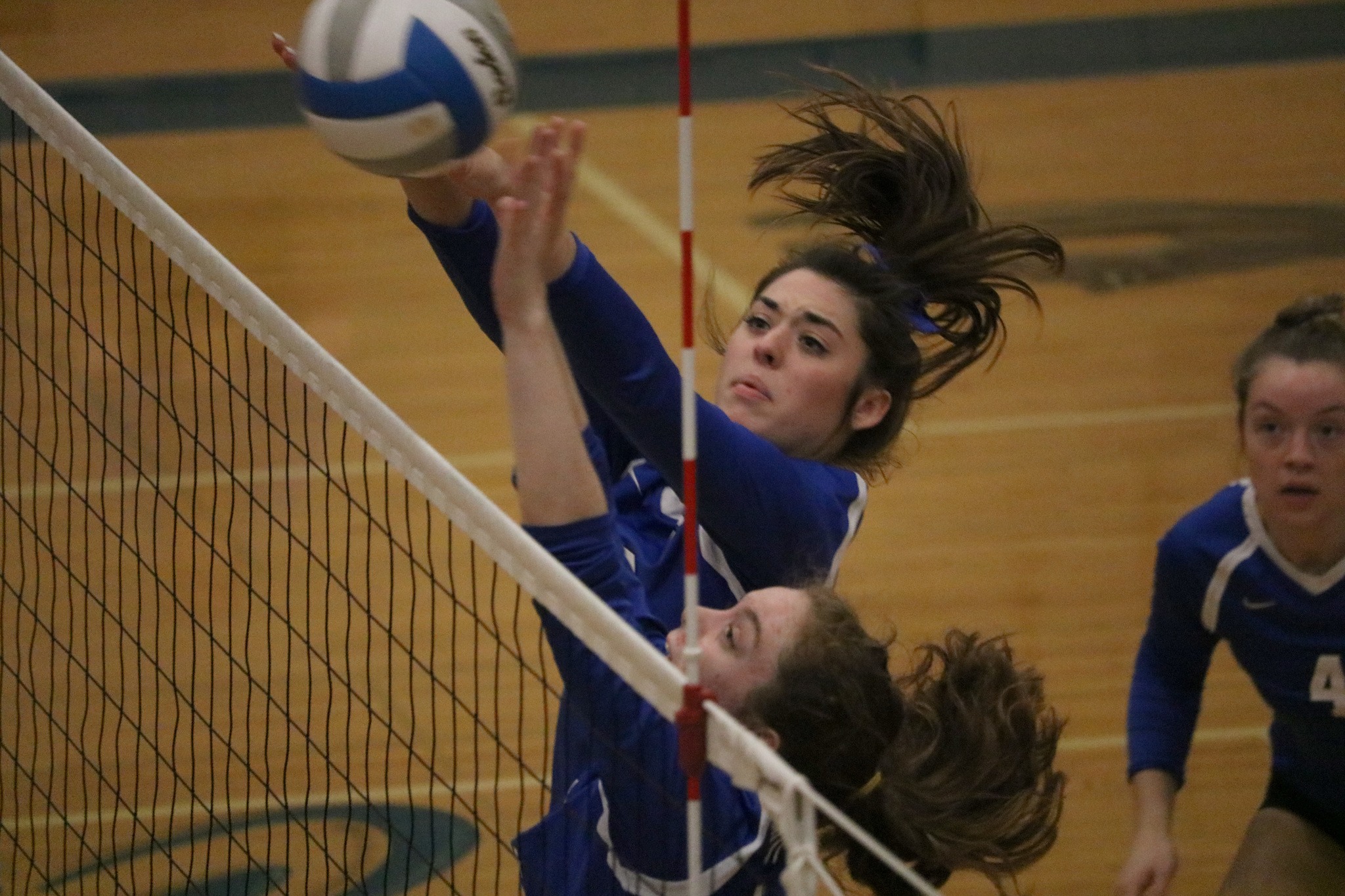 Sydney Cowan (top) and Camille Gilmore reach for a block during Bothell's 3-1 win over Eastlake on Wednesday