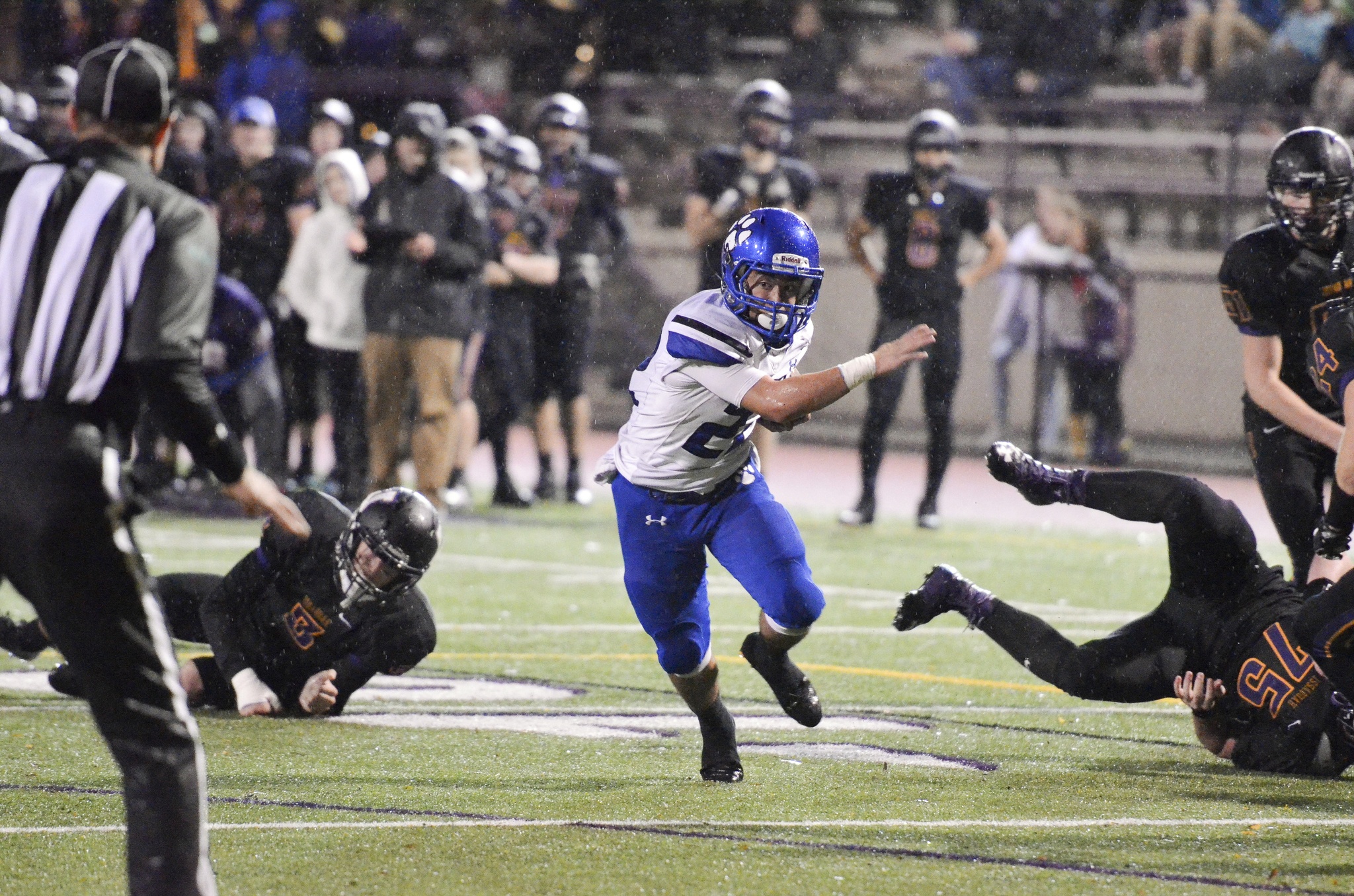 Bothell High freshman Christian Galvan heads for a gap at the goal line on Friday
