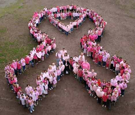 Students and staff of Kenmore’s Arrowhead Elementary School gathered together recently to form this pink ribbon and show their support for Arrowhead staff member Kathy Boyle