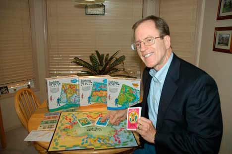 Kenmore’s William “Bill” Higgins displays his Footsteps board game