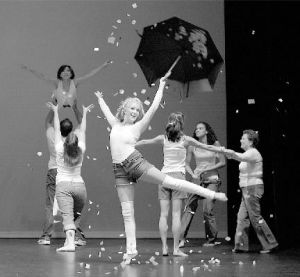 Tiffany Teichrow (front) performs with fellow dancers at a recent Kirkland Dance Center show. The dance center will present a showcase of student