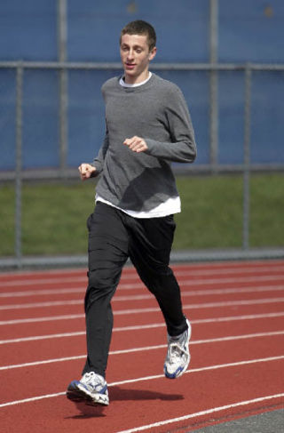 Trey Parry cruises around the track during a Bothell High practice. He is making his mark as a solid distance runner.