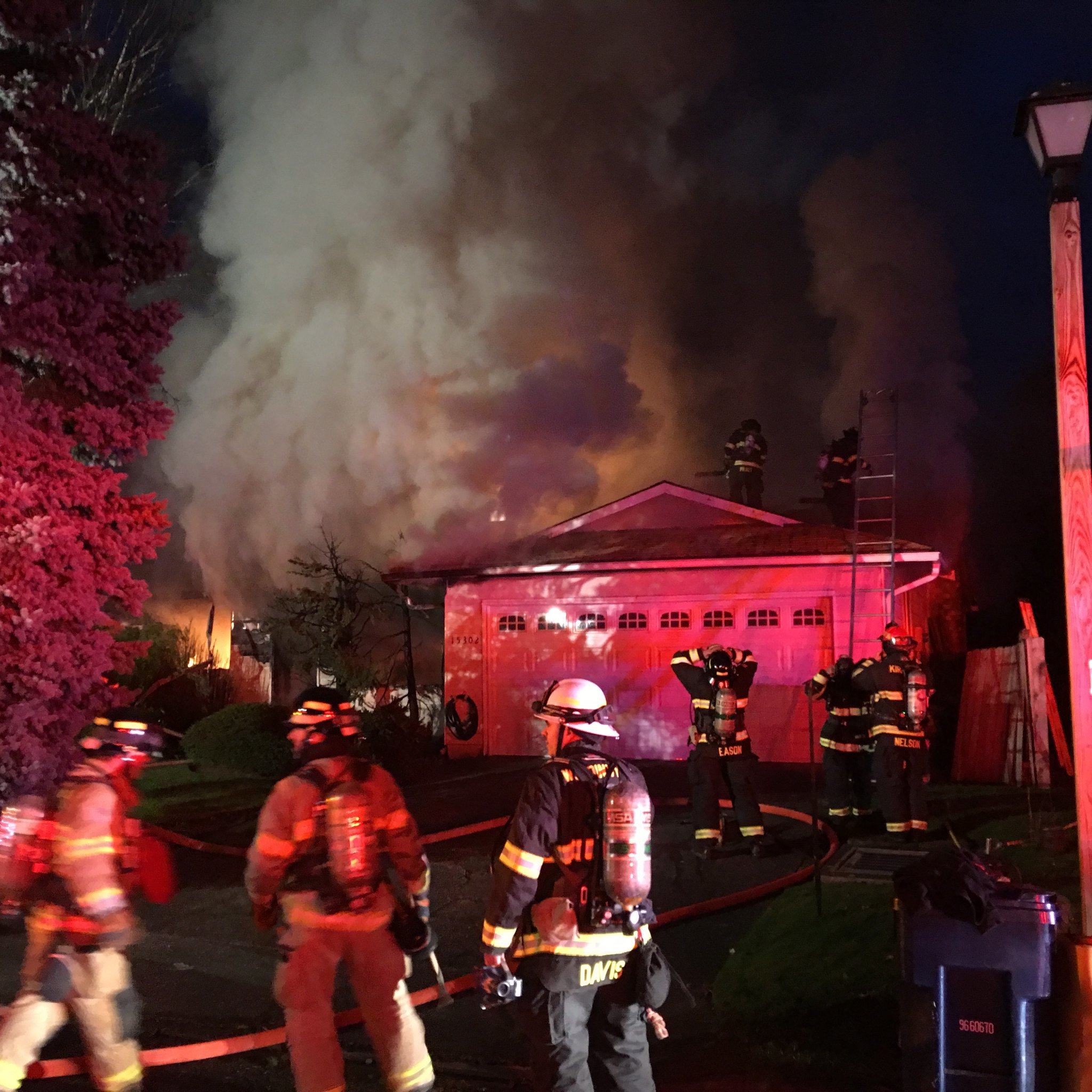 Five departments, including Bothell Fire and E.M.S., responded to this house fire in Bothell on Monday evening. Photo courtesy of the Bothell Police Department