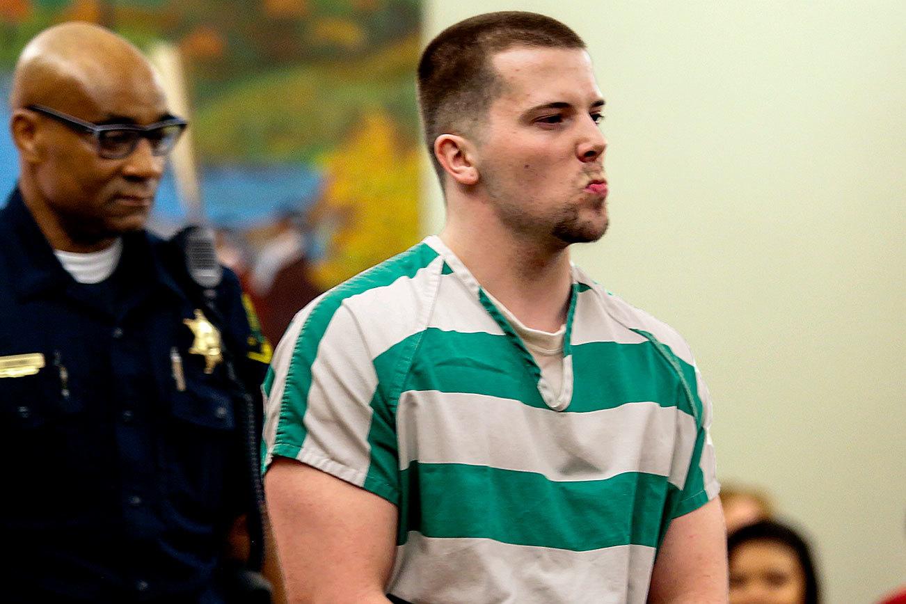 Jacob Tusken is led into Snohomish County Superior Court Monday to be sentenced for the first-degree assault of his own infant daughter. The child is left with permanent brain injuries and will require constant care for life. DAN BATES/The Herald