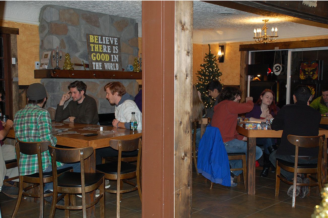 Patrons at Zulu’s Board Game Cafe in Bothell play games. Contributed photo