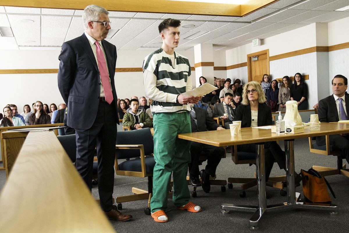 Former University of Washington Bothell-student Allen Ivanov reads a statement before being sentenced to life in prison without parole for opening fire and killing three at a house party in Mukilteo in July during a hearing at Snohomish County Superior Court in Everett on Thursday, Jan. 12. Ian Terry/The Herald